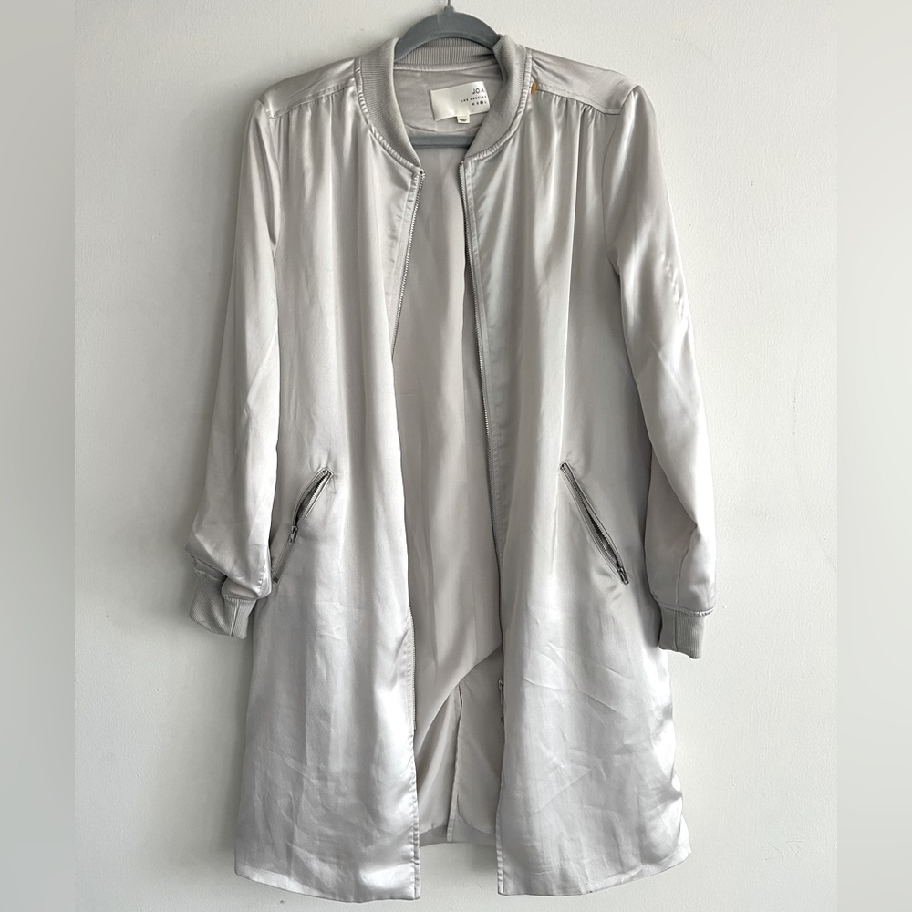 Brand new silver slinky jacket